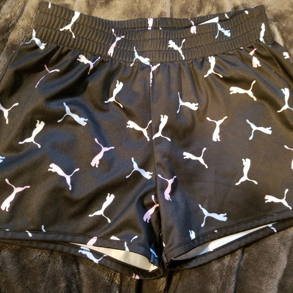 Girl's Puma Black Shorts with Multicoled Puma Logo. Size 7